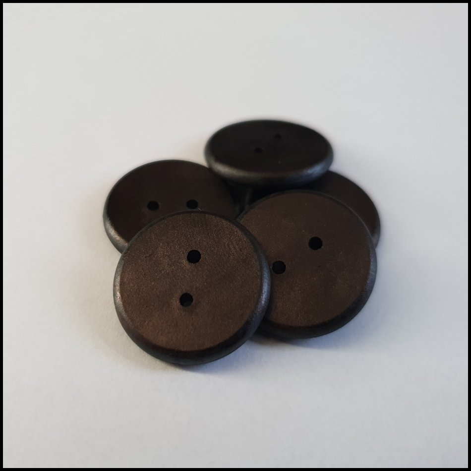 The hobby horse's identification chip, the button-like